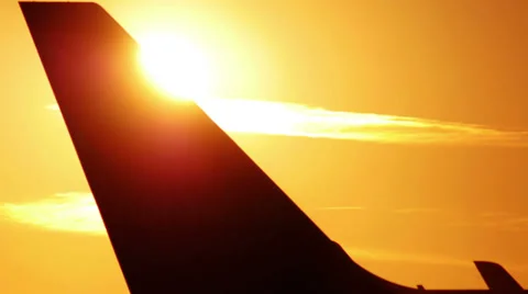 Airplane against Dawn Stock Footage 32178107