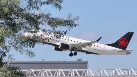 Airplane AIr Canada Embraer ERJ-175SU plane take-off Montreal Canada airport Stock Footage 300959123