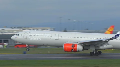 Airplane airbus 330 sas deploy thrust reversal jet engine close up Stock Footage 108533552