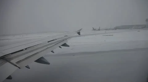 Airplane in the airstrip in winter, germany Stock Footage