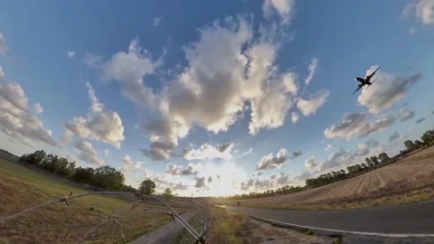 Airplane approaching the landing runway at sunset, Ultra wide view Stock Footage 162394513
