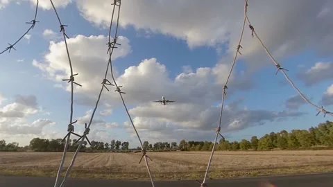 Airplane approaching the landing runway at sunset, Ultra wide view Stock Footage 162394523