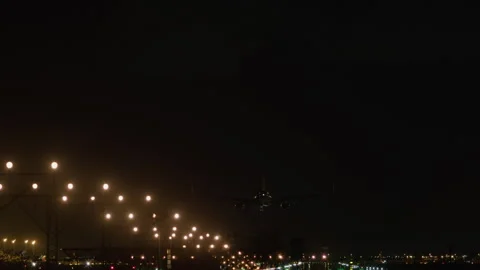 Airplane approaching runway night Stock Footage 270144634