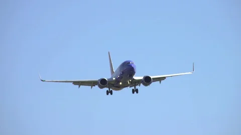 Airplane Approaching, Sunny Stock Footage 129190707