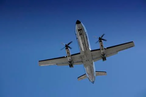 Airplane approaching for touchdown Stock Photos