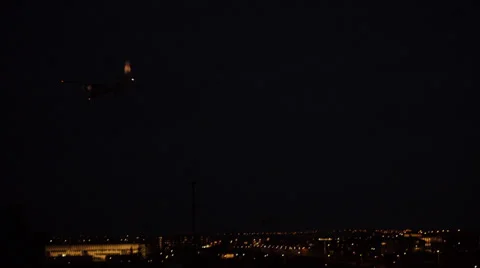 Airplane Arriving to Town Stock Footage 36634442