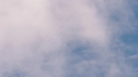 Airplane on the background of blue cloudy sky Stock Footage 158322615