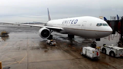 Airplane backing out of gate Stock Footage 47610541