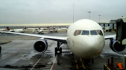 Airplane backs away from Gate (720-30FPS).mp4 Stock Footage 10978808