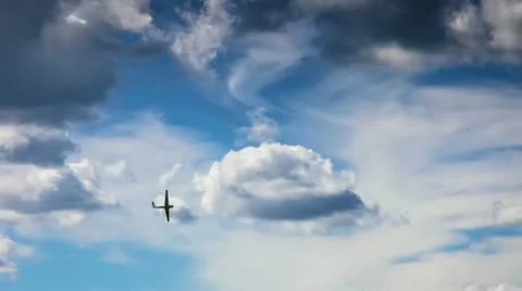 Airplane on beautiful cloudy sky ProRes Stock Footage 12552390