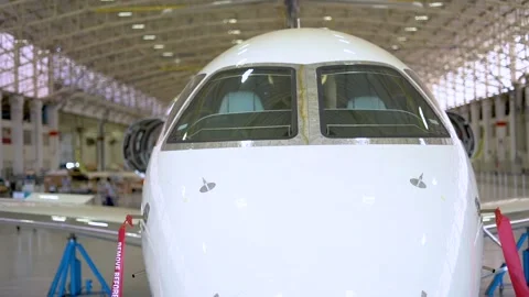 Airplane being built in slow motion Stock Footage