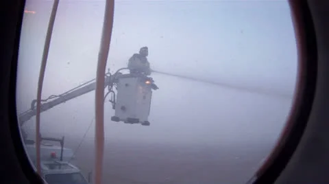 Airplane being de-iced in bad weather Video stock 24657718