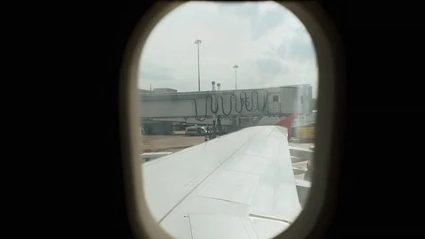 Airplane being preparing ready for takeoff in international airport Stock Footage 77621610