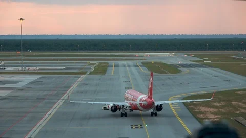 Airplane being pushed back for takeoff at Kuala Lumpur International Airport Stock-Footage 106947228