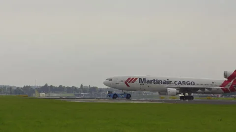 Airplane being towed across the active runway Stock Footage 45998101
