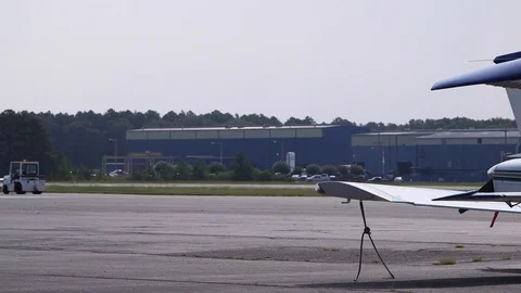 AIRPLANE BEING TOWED Stock Footage 93401855