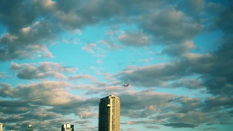 Airplane in the blue sky Stock Footage 82702502