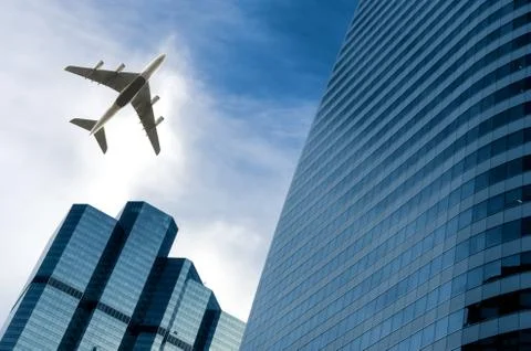 Airplane with building. Stock Photos