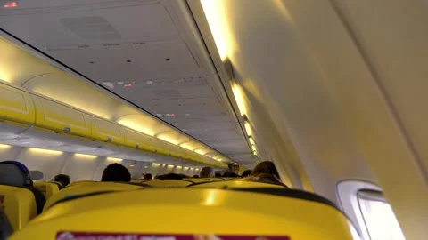 Airplane cabin during flight in 4k slow motion 60fps Stock Footage 280566542