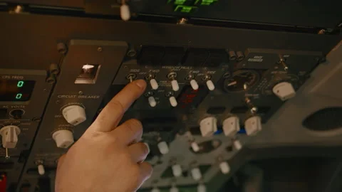 Airplane captain starting aircraft engine power buttons Vidéo 211283985