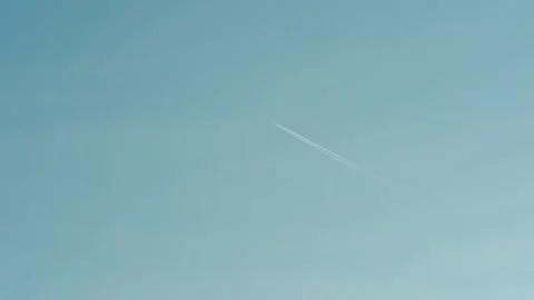 Airplane in Clear Blue Sky Stock Footage 305723678