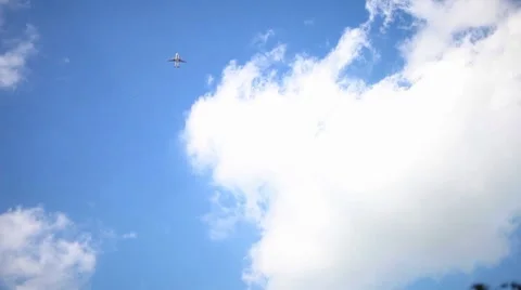 Airplane in the clouds Stock Footage 8875725
