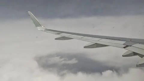 Airplane in the clouds Stock Footage 217412345