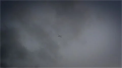 Airplane in the clouds in the sky Video stock 40014318