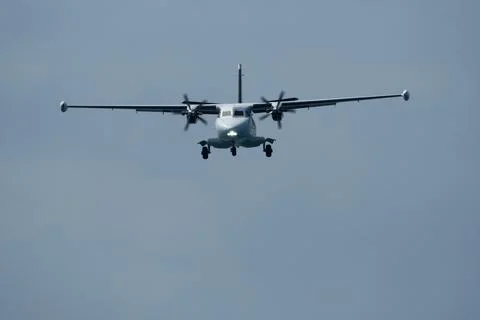 Airplane in the cloudy sky. Foto stock