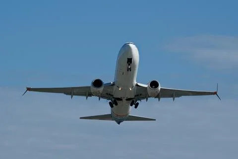Airplane in the cloudy sky. Foto stock