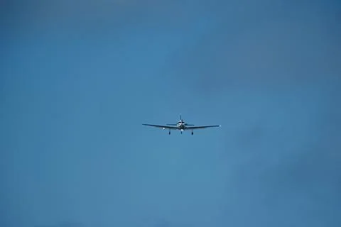 Airplane in the cloudy sky. Foto stock