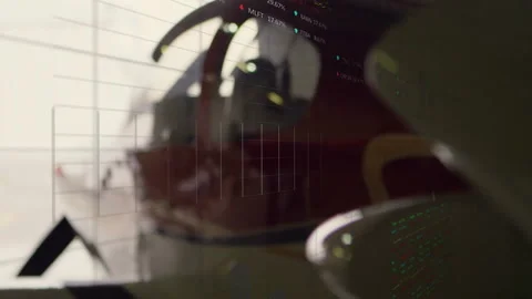 In airplane cockpit, data processing animation overlaying flight instruments, Video stock 304644307
