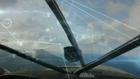 Airplane cockpit with navigation data processing animation over landscape Stock Footage 305020872