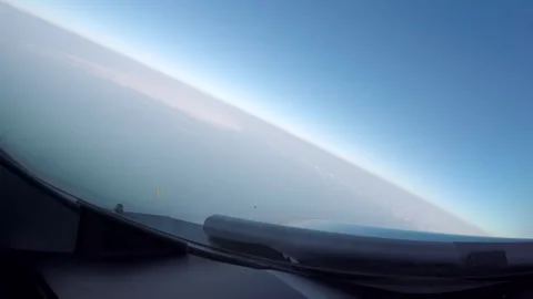 Airplane cockpit point of view during flight curve to normal Stock Footage 248035310