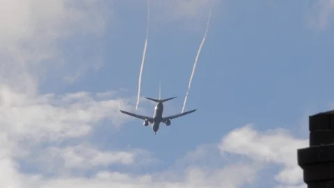 Airplane Condensation Trails Stock Footage 89554495