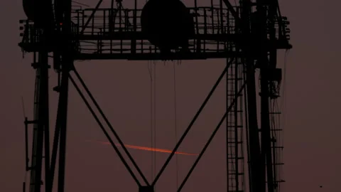 Airplane contrail, sunset Stock Footage 163986251
