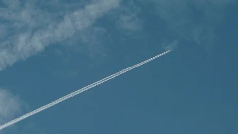 Airplane crossing the sky Stock Footage 88341736