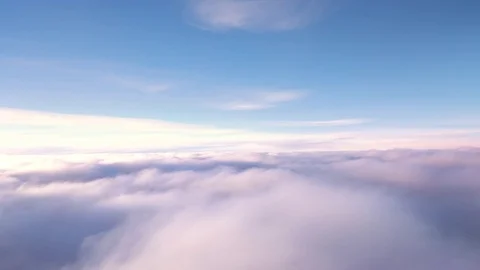 Airplane decent on sunset clouds Stock-Footage 71555858