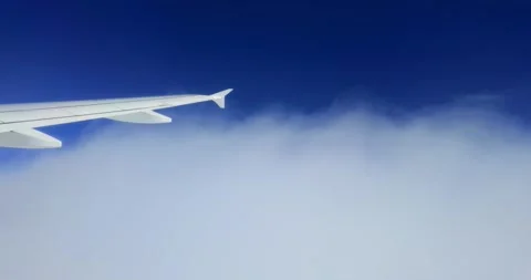 Airplane descending into dense white cloud layer Stock Footage 320289400