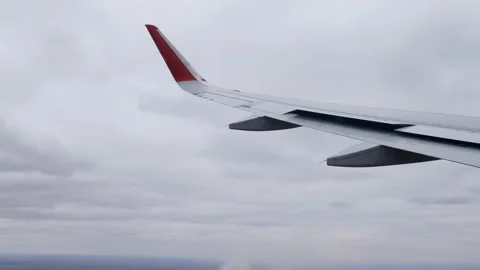Airplane descent and U-turn in the sky with clouds. Stock Footage 166314488