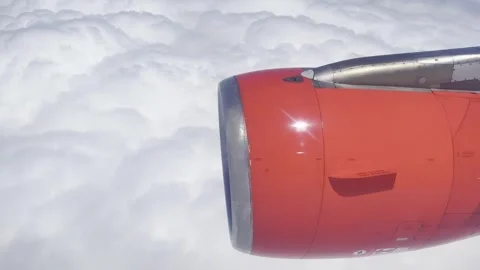 Airplane desending above the clouds. Plane in flight. Airplane engine. Video stock 277439003