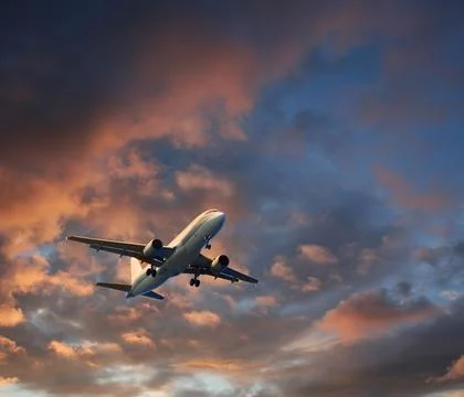 Airplane dramatic cloudscape takeoff Stock-Fotos