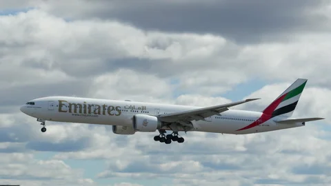 Airplane emirates boeing 777 arrival slow motion oslo airport Stock Footage 244631856
