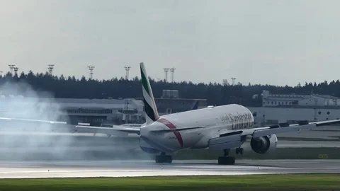 Airplane Emirates Boeing 777 Hard Landin... | Stock Video | Pond5