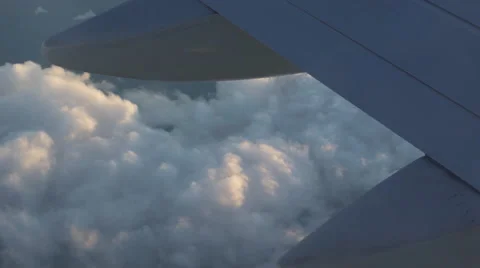 Airplane engine above the clouds (UNGRADED) Video stock 61634953