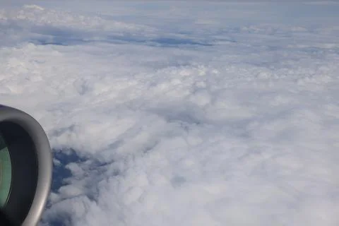 Airplane engine above dense cloud layer Foto stock