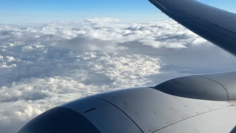 Airplane Engine And Blue Sky View With Sunlight And Clouds Stock Footage 319959015