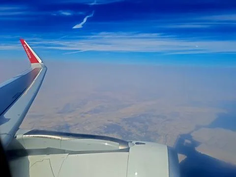 Airplane engine Beautiful cloudy sky amazing view. Stock Photos