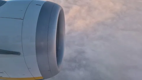 Airplane engine during flight above the clouds Stock Footage 345098696