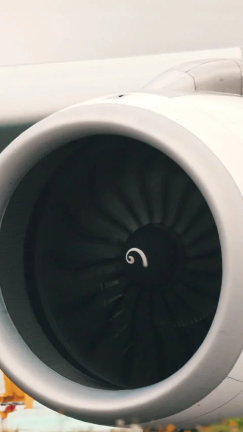 Airplane engine exhausting hot air and water vapor during maintenance Stock Footage 327637125